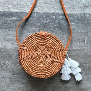 Round Woven Tan Crossbody Bag with White Tassels